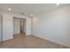 Spacious bedroom with wood-look flooring, and natural light, ready to customize to your style preferences at 34505 N Timberlake N Mnr, San Tan Valley, AZ 85144