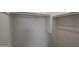 An empty walk-in closet featuring double rods for maximum storage, perfect for organizing your wardrobe at 34505 N Timberlake N Mnr, San Tan Valley, AZ 85144