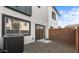 Spacious backyard featuring a gravel area and stucco wall with sliding glass door at 7504 S 75Th Dr, Laveen, AZ 85339