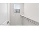 Bright, white closet with window, shelf, and rod at 7504 S 75Th Dr, Laveen, AZ 85339