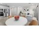 Open-concept living room featuring a dining area and modern decor at 7504 S 75Th Dr, Laveen, AZ 85339