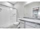 Features include a glass-enclosed shower, granite countertop, toilet, and bright lighting creating a functional space at 8975 S 168Th Ln, Goodyear, AZ 85338