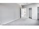 Empty bedroom with carpet flooring and closet at 8975 S 168Th Ln, Goodyear, AZ 85338