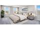 Relaxing main bedroom with plush bedding, soft lighting, and scenic views at 8975 S 168Th Ln, Goodyear, AZ 85338