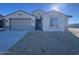 New single-story home with attached garage and desert landscaping at 23327 W Florence Ave, Buckeye, AZ 85326