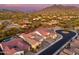 Aerial view of a home with a desert landscape and mountain views at 34801 N 53Rd St # 26, Cave Creek, AZ 85331