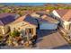 Single story home with tile roof, two car garage, and desert landscaping at 34801 N 53Rd St # 26, Cave Creek, AZ 85331