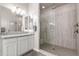 Clean bathroom with single vanity and large shower at 34801 N 53Rd St # 26, Cave Creek, AZ 85331