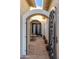 Elegant entry with arched walkway and iron gate at 34801 N 53Rd St # 26, Cave Creek, AZ 85331