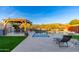 Relaxing pool area with a gazebo and lounge chairs at 34801 N 53Rd St # 26, Cave Creek, AZ 85331