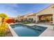 Inviting rectangular pool with surrounding patio at 34801 N 53Rd St # 26, Cave Creek, AZ 85331