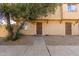 Tan stucco building exterior with walkway and small tree at 4625 E Southgate Ave, Phoenix, AZ 85040