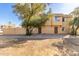 Front view of tan two-story building, landscaping, and parking at 4625 E Southgate Ave, Phoenix, AZ 85040