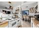 Efficient kitchen with stove, oven, and ample counter space at 4625 E Southgate Ave, Phoenix, AZ 85040