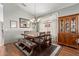 Dining area with chandelier and hutch for storage at 5827 W Charter Oak Rd, Glendale, AZ 85304