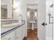 Elegant bathroom with patterned tile and a pedestal sink at 6319 E Mariposa St, Scottsdale, AZ 85251