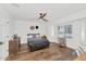 Bright bedroom featuring hardwood floors and a ceiling fan at 6319 E Mariposa St, Scottsdale, AZ 85251