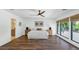 Main bedroom with hardwood floors and large windows at 6319 E Mariposa St, Scottsdale, AZ 85251