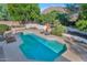 Inviting pool with surrounding patio and lounge chairs at 6319 E Mariposa St, Scottsdale, AZ 85251