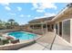 Inviting pool area with a large pool and patio at 13026 W Foxfire Dr, Sun City West, AZ 85375