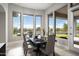 Bright dining room with large windows and scenic views at 14146 N 106Th Way, Scottsdale, AZ 85255