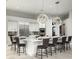 Large kitchen island with seating and modern fixtures at 14146 N 106Th Way, Scottsdale, AZ 85255