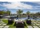 Luxury backyard oasis with a sparkling pool, spa, and fire pit at 14146 N 106Th Way, Scottsdale, AZ 85255