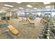 Well-equipped fitness center with treadmills, weights, and exercise machines for a complete workout experience at 17915 W Silver Fox Way, Goodyear, AZ 85338