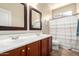 Bathroom features a double sink vanity and neutral accents at 18174 W Wind Song Ave, Goodyear, AZ 85338