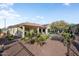 Backyard view showcasing home's exterior and landscaping at 20103 N 265Th Ave, Buckeye, AZ 85396