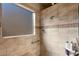 Large shower with tiled walls and glass enclosure at 20103 N 265Th Ave, Buckeye, AZ 85396