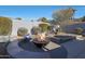 Relaxing backyard oasis with fire pit and seating at 2237 E Nicolet Ave, Phoenix, AZ 85020