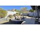 Relaxing backyard oasis with fire pit, stone pathway and desert landscaping at 2237 E Nicolet Ave, Phoenix, AZ 85020