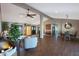 Spacious living room featuring hardwood floors, comfortable seating, and large windows at 2237 E Nicolet Ave, Phoenix, AZ 85020