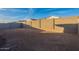 Large backyard with block wall fencing at 24144 W Gibson Ln, Buckeye, AZ 85326