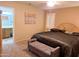 Bright bedroom with ensuite bathroom and ample space at 7829 E Naranja Ave, Mesa, AZ 85209