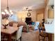 Dining area with seating for six, adjacent to the kitchen and living room at 7829 E Naranja Ave, Mesa, AZ 85209