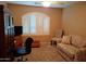 Home office or guest room with comfortable seating at 7829 E Naranja Ave, Mesa, AZ 85209