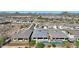 Aerial view of a house with a pool, showcasing the property and surrounding neighborhood at 13487 W Roy Rogers Rd, Peoria, AZ 85383