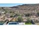 Aerial view of a backyard oasis with a pool and desert landscape at 13487 W Roy Rogers Rd, Peoria, AZ 85383