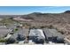 Aerial view of a house and neighborhood, highlighting the property's location and surroundings at 13487 W Roy Rogers Rd, Peoria, AZ 85383