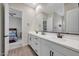 Double vanity bathroom with modern fixtures and a view into bedroom at 13487 W Roy Rogers Rd, Peoria, AZ 85383