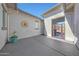 Private courtyard with decorative gate and potted plant at 13487 W Roy Rogers Rd, Peoria, AZ 85383