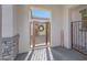 Inviting entryway with a decorative gate and welcome sign at 13487 W Roy Rogers Rd, Peoria, AZ 85383