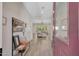 Bright and airy entryway with wood floors and views into the living room at 13487 W Roy Rogers Rd, Peoria, AZ 85383