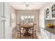 Charming breakfast nook in kitchen with white cabinetry at 16502 W Arroyo Ct, Surprise, AZ 85374