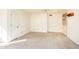 Spacious bedroom featuring neutral carpet and a louvered closet at 1560 E Riviera Dr, Chandler, AZ 85249