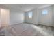 Bright bedroom featuring neutral walls and carpet at 26367 S 231St Way, Queen Creek, AZ 85142
