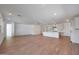Open concept kitchen with island, stainless steel appliances, and light cabinets at 26367 S 231St Way, Queen Creek, AZ 85142
