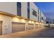 Row of attached garages with modern design and ample parking at 4050 N 12Th St # 1, Phoenix, AZ 85014